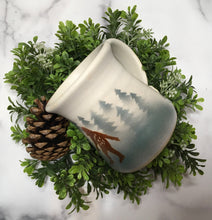 Load image into Gallery viewer, Handmade clay mug with green  Douglas fir trees and Sasquatch.  Handmade by Lindsoe Clayworks