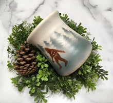 Load image into Gallery viewer, Handmade Clay mug with pinr  trees and sasquatch- made by  Lindsoe Clayworks
